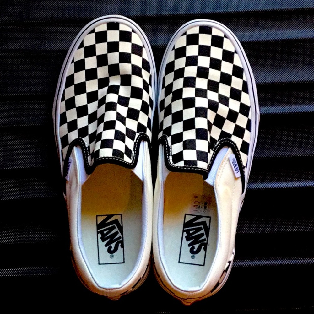 Black and white checkered vans slip on shoes